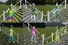Pick the image of the person walking up the stairs
